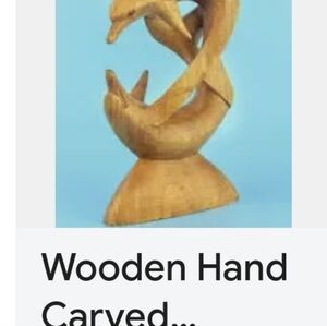 Dancing dolphins wooden carving